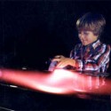 Playing with a magnet and a plasma discharge tube, the "Aurora Borealis Tube Display," by Resonance Research Corporation.
