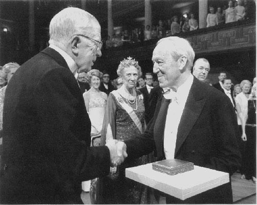 Hannes Alfven receiving his Nobel prize from the King of Sweden.